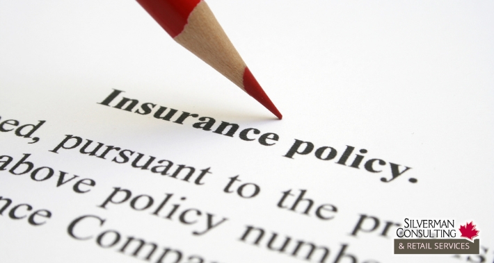 Red pencil pointing to the words “Insurance policy” on a printed business insurance document. | Silverman Consulting & Retail Services | Retail Sales Consultants Going Out Of Business Sale Retirement Sale Store Moving Store Closing Sale Consultants